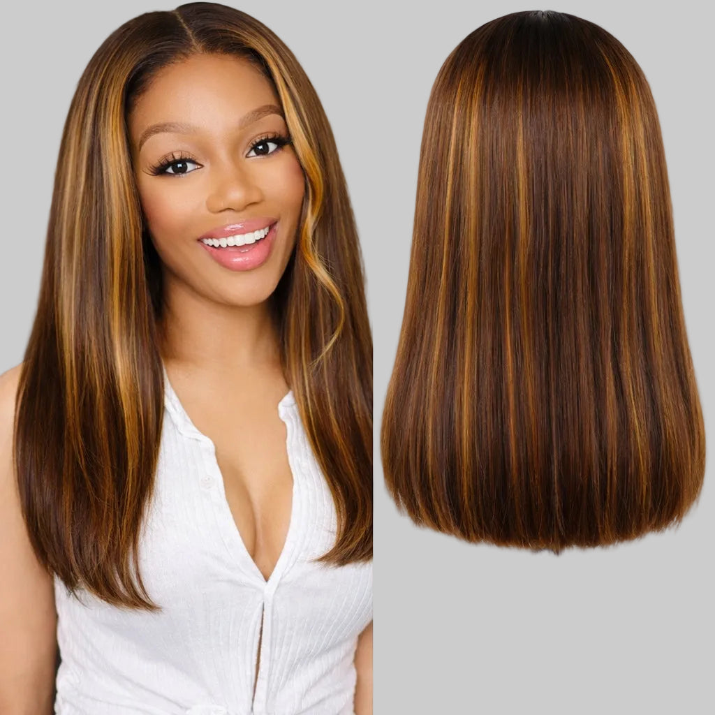 Woman with long brown hair next to a wig on a stand