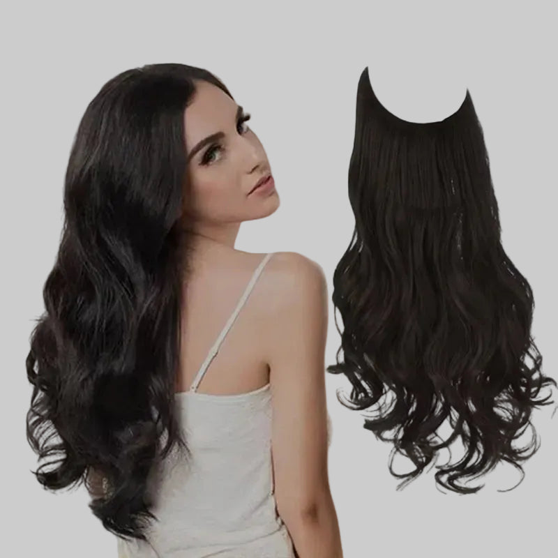 Woman with long wavy hair and a hair extension on a glittery background
