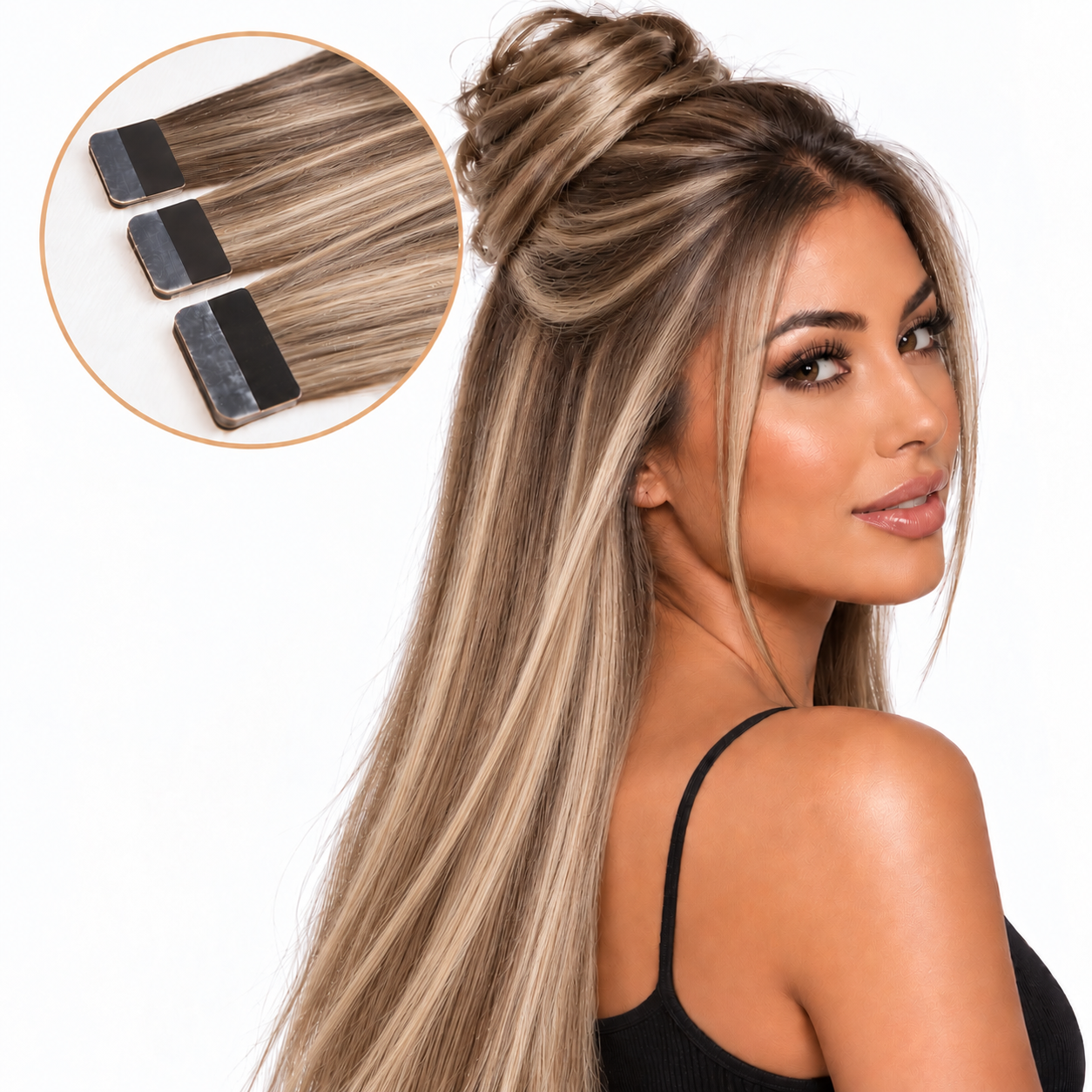 Ash Blonde Balayage #4/18/22 tape-in extensions on a model with a half-up bun and inset tape bonds | Glam N' Go Style⠋